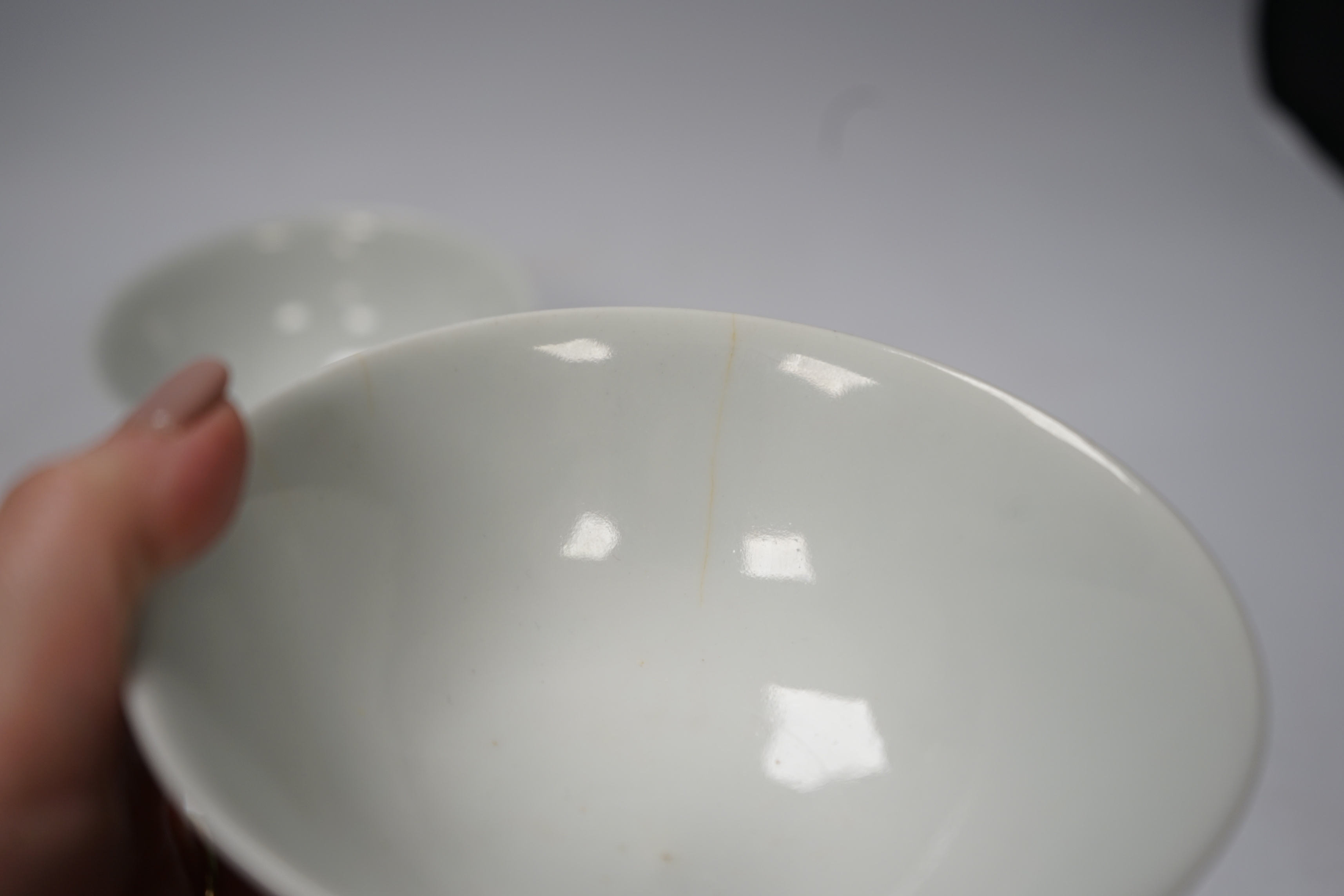 Six Chinese ceramic items; a teapot, two bowls and three small dishes, teapot 10cm